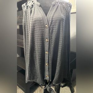 Grey sleeveless knit top